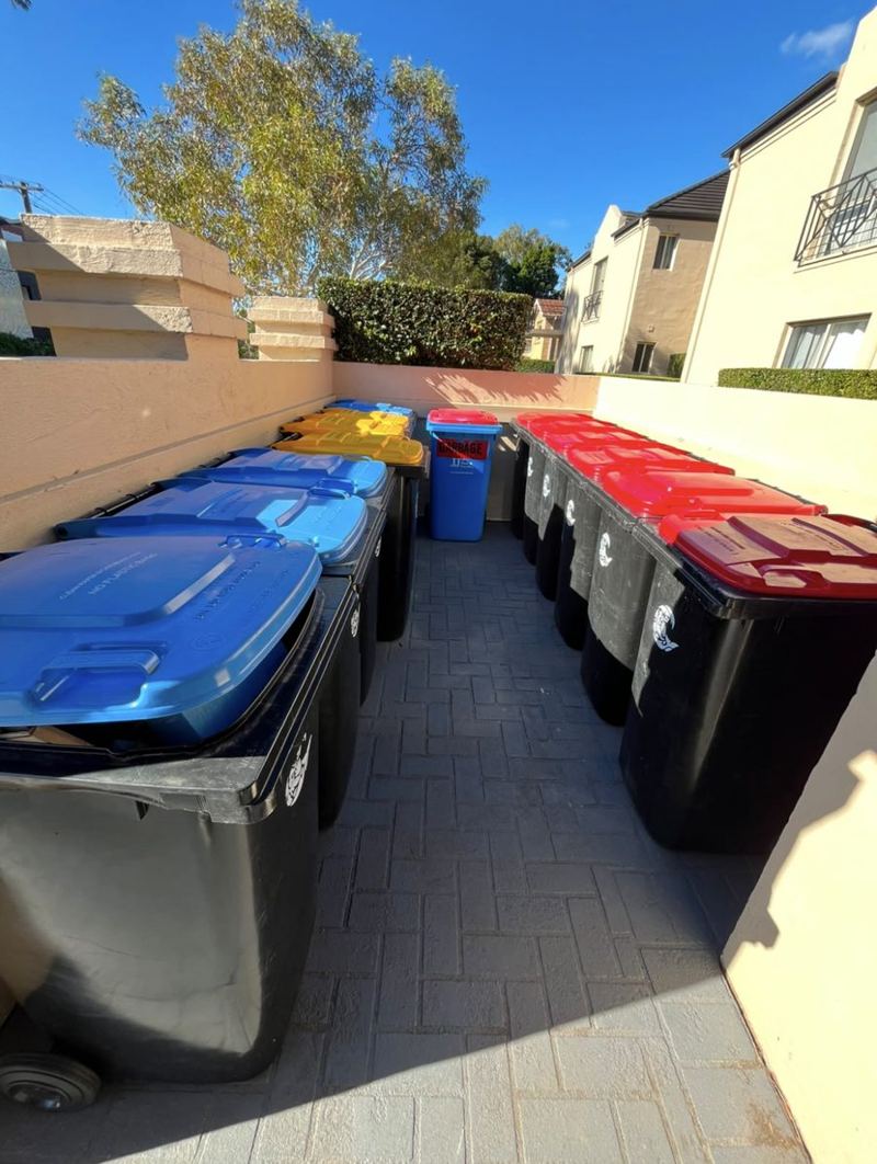 Tidy bin area with paved floor swept clean